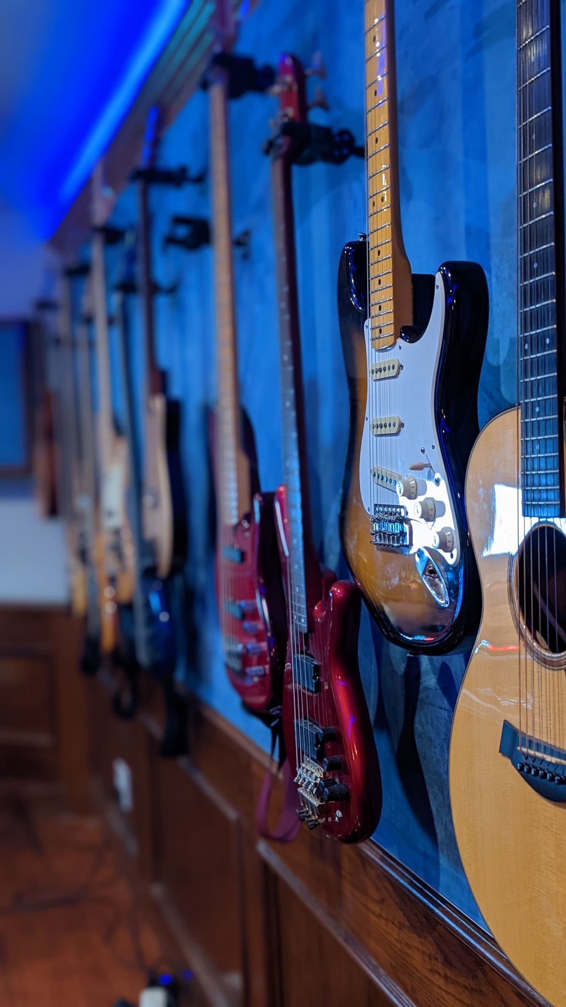 GuitarWall1 scaled True Songs Productions